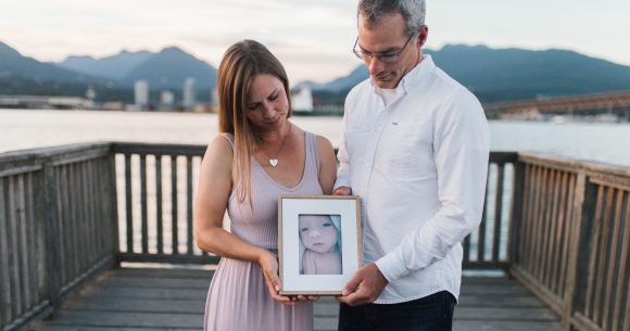 Marie and Wes Toews show a treasured portrait of Sophia