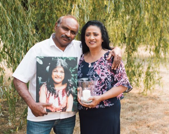 Sam and Helen Premia with a photo of their daughter Angelina