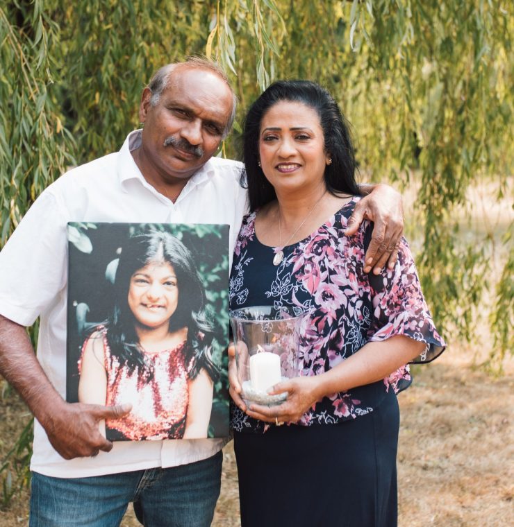 Sam and Helen Premia with a photo of their daughter Angelina