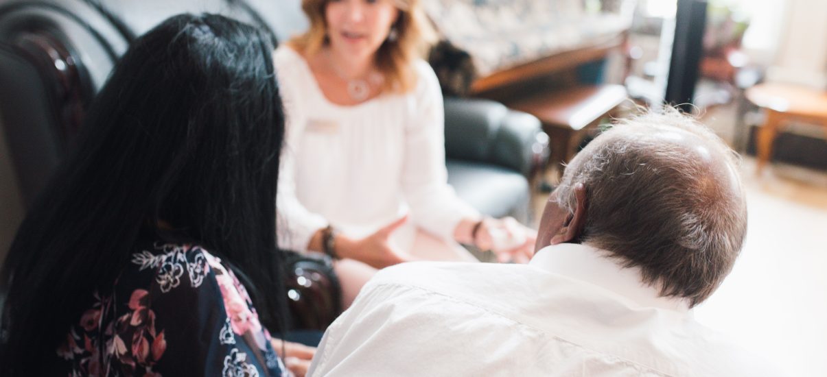 Canuck Place Nurse practitioner Camara Van Breemen talks with the Premia family.